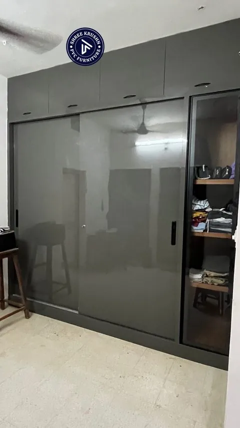 Charcoal PVC sliding wardrobe with a glass fronted display section - Shree Krushn PVC Furniture, Nikol, Ahmedabad
