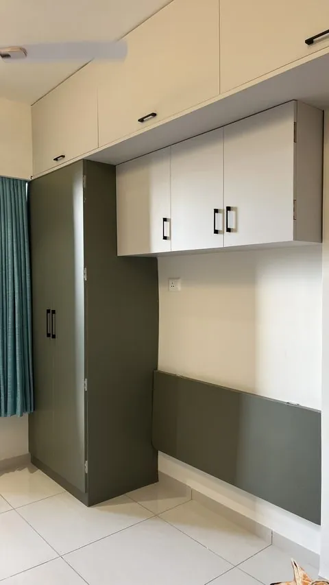 Olive green PVC wardrobe with white overhead units and a fold down study top - Shree Krushn PVC Furniture, Nikol, Ahmedabad